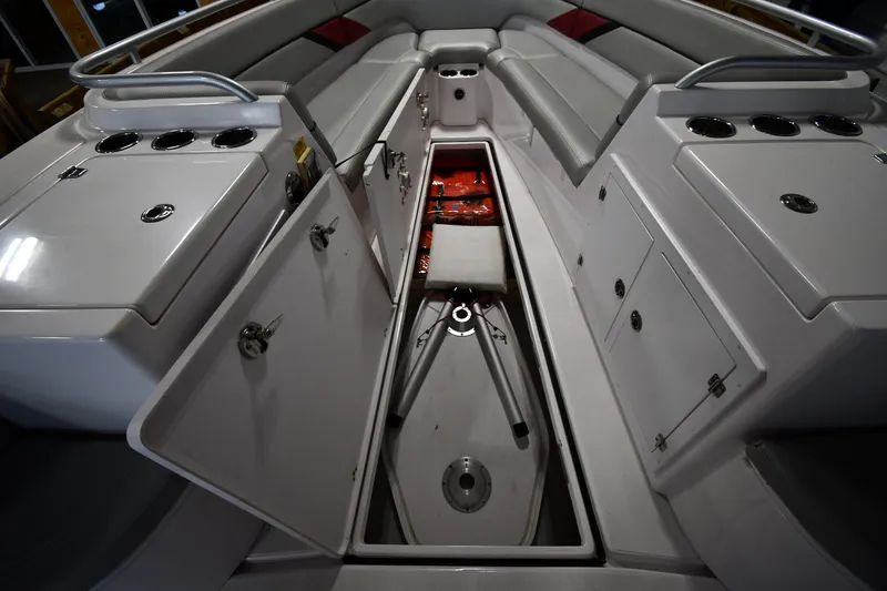 Slide: The Image of 2009 Donzi 38 ZFX Open boat interior with storage compartments and seating. - 38