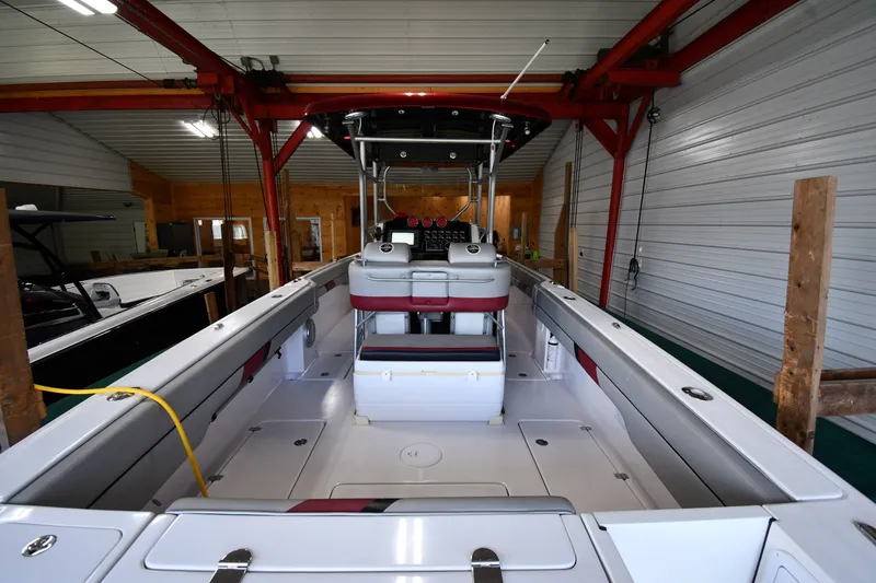 Slide: The Image of 2009 Donzi 38 ZFX Open boat interior in a storage facility. - 17