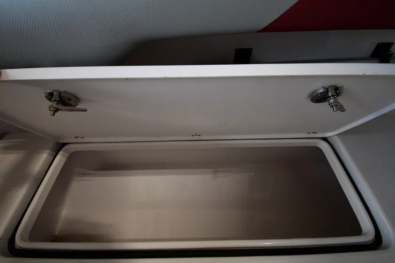 Slide: The Image of Open storage compartment on a 2009 Donzi 38 ZFX Open boat. - 45