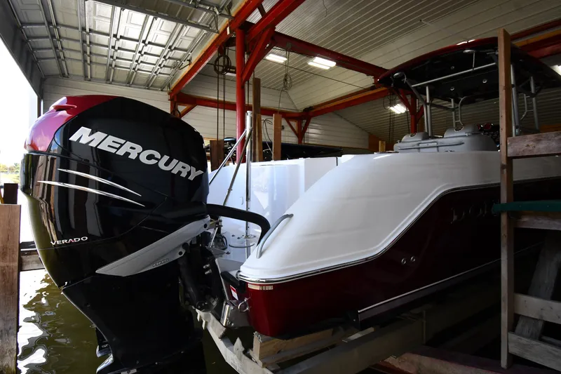 Slide: The Image of 2009 Donzi 38 ZFX Open boat with Mercury Verado engine in a storage facility. - 9