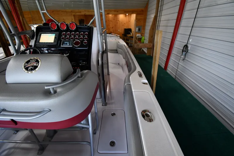 Slide: The Image of 2009 Donzi 38 ZFX Open boat interior with control panel and seating. - 29