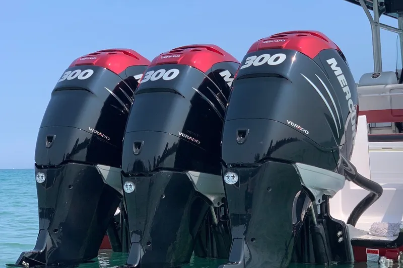 Slide: The Image of Triple Mercury Verado 300 engines on a 2009 Donzi 38 ZFX Open boat. - 2