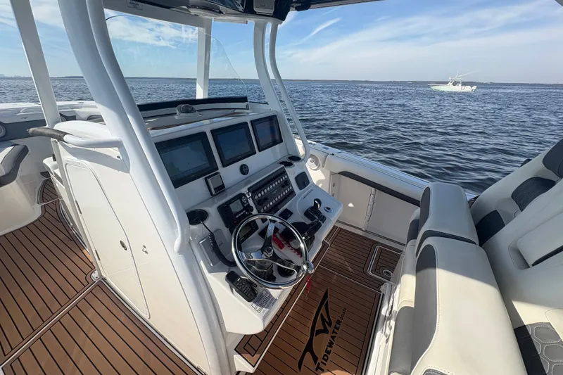 Slide: The Image of 2017 Sea Fox 328 Commander boat interior with advanced navigation system on open water. - 6