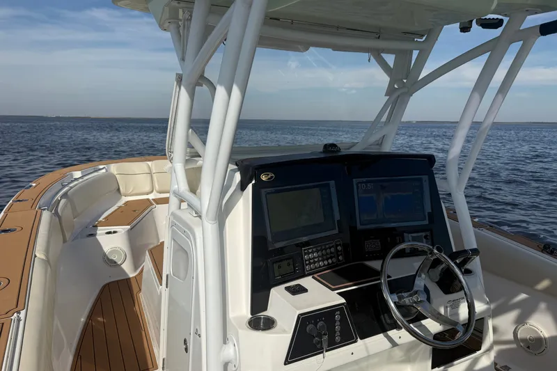 Slide: The Image of 2017 Sea Fox 328 Commander boat dashboard with ocean view. - 7