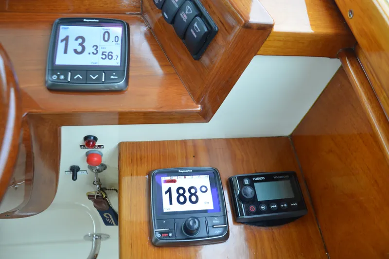 Slide: The Image of Hinckley Picnic Boat 36 EP 2002 dashboard with navigation instruments and controls. - 16