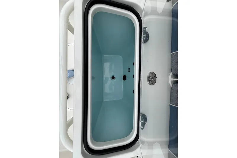 Slide: The Image of Livewell compartment on a 2027 Ranger 2660 Bay boat, featuring a sleek design. - 16