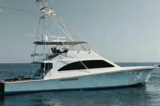 Slide: The Image of 2005 Ocean Yachts 73 Super Sport cruising on open water. - 6