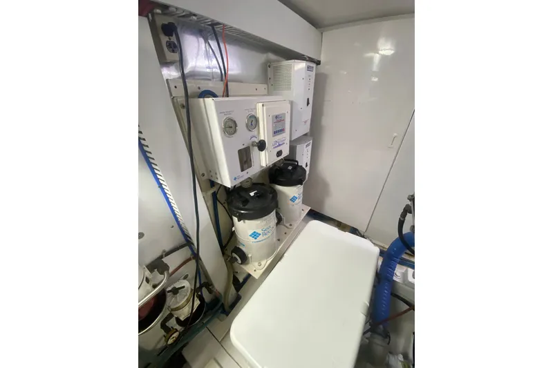 Slide: The Image of Engine room of 2005 Ocean Yachts 73 Super Sport with water filtration system. - 39