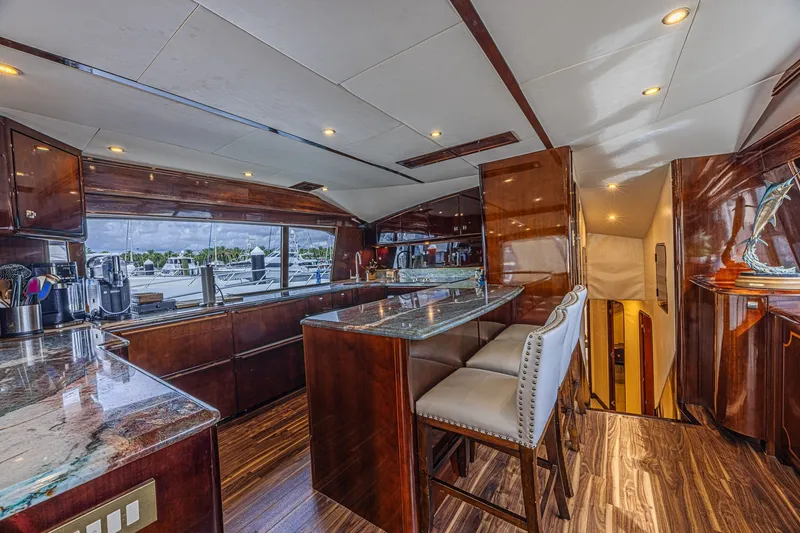 Slide: The Image of Luxurious interior of 2005 Ocean Yachts 73 Super Sport with elegant wood finishes and modern amenities. - 27