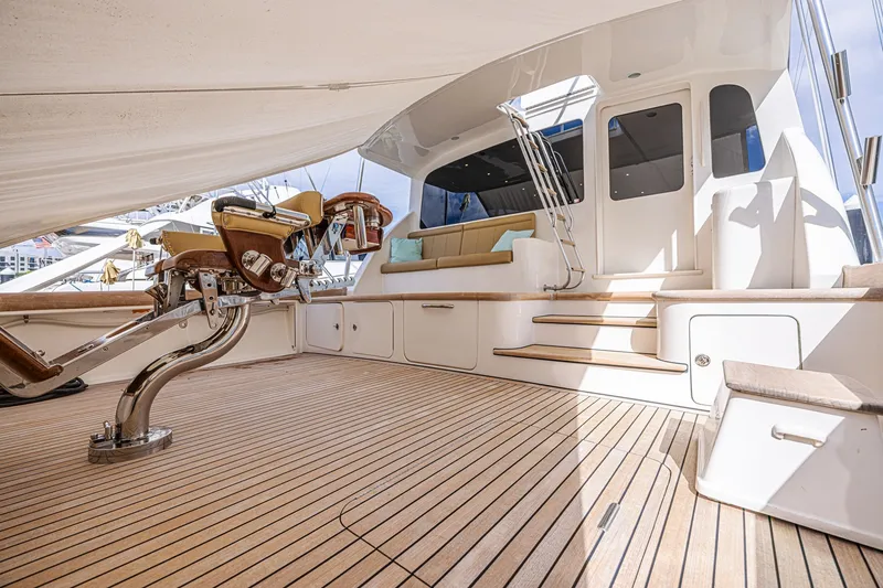 Slide: The Image of Luxurious 2005 Ocean Yachts 73 Super Sport with spacious deck and elegant seating area. - 12