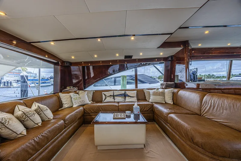 Slide: The Image of Luxurious interior of 2005 Ocean Yachts 73 Super Sport with leather seating and nautical decor. - 30