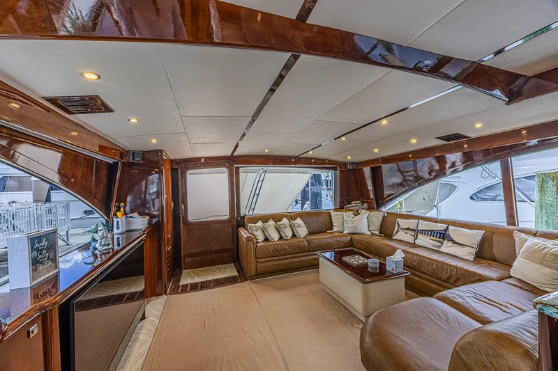 Slide: The Image of Luxurious interior of 2005 Ocean Yachts 73 Super Sport with plush seating and elegant wood finishes. - 29