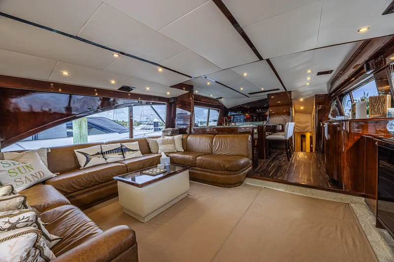 Slide: The Image of Luxurious interior of 2005 Ocean Yachts 73 Super Sport with plush seating and elegant wood finishes. - 31