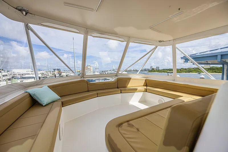 Slide: The Image of Luxurious interior of 2005 Ocean Yachts 73 Super Sport with panoramic marina view. - 11