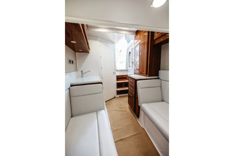 Slide: The Image of Luxurious interior of 2026 HCB 48 Campeón yacht with elegant seating and cabinetry. - 38