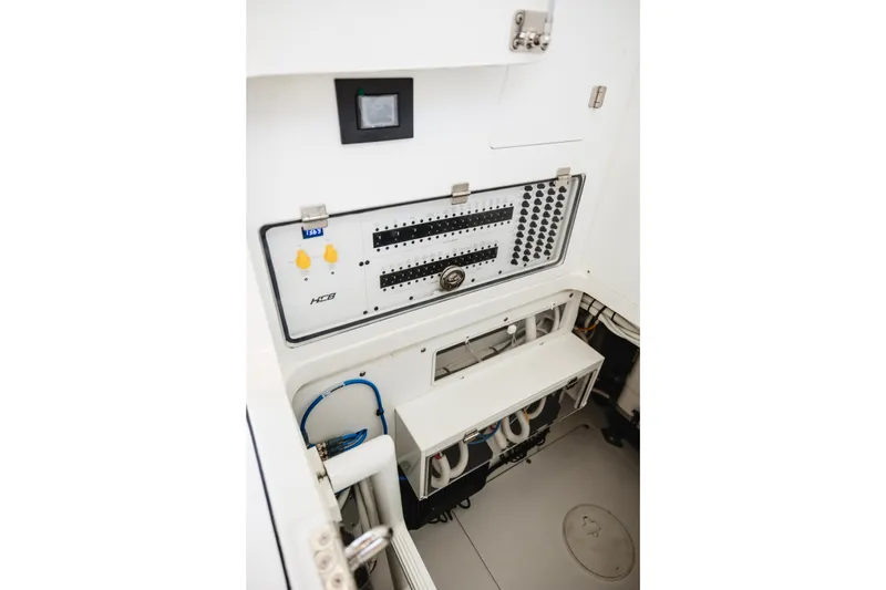 Slide: The Image of Electrical panel inside 2026 HCB 48 Campeón boat, showcasing advanced control systems. - 33