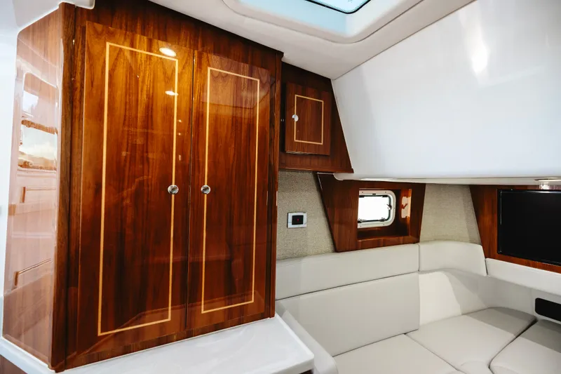 Slide: The Image of Luxurious interior of 2026 HCB 48 Campeón yacht with elegant wood cabinetry. - 25
