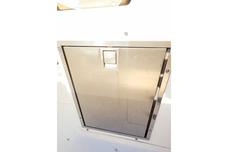 Slide: The Image of Stainless steel compartment door on 2015 Southport 33 FE boat. - 16