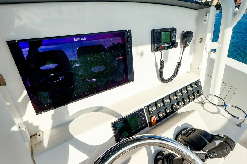 Slide: The Image of Control panel of 2015 Southport 33 FE boat with navigation and communication equipment. - 6