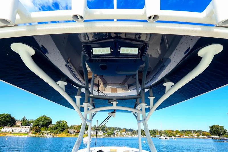 Slide: The Image of 2015 Southport 33 FE boat canopy with scenic waterfront view. - 18