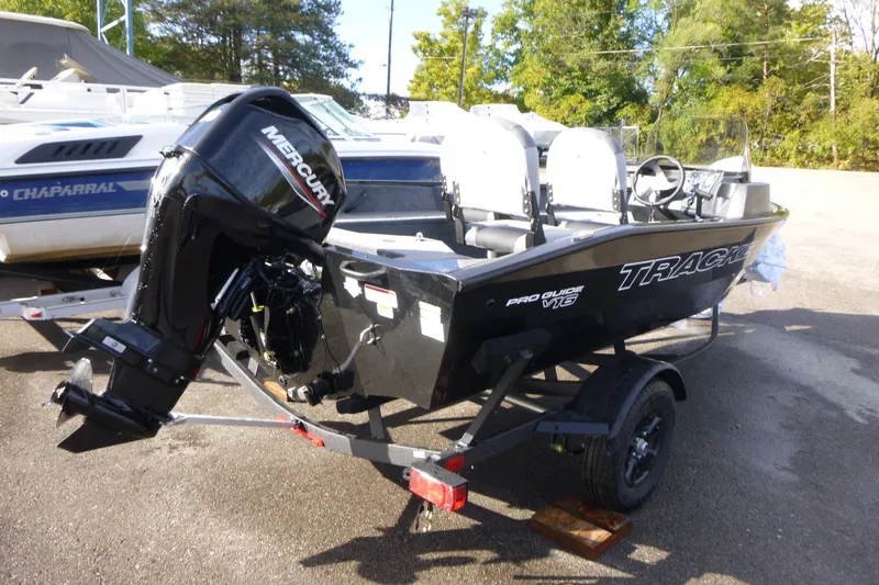 The Image of 2027 Tracker Pro Guide V-16 SC boat with Mercury outboard motor on trailer. - 0
