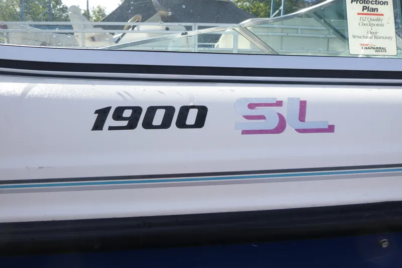 Slide: The Image of Chaparral 1900 SL boat, 1992 model, featuring sleek design and warranty details. - 12