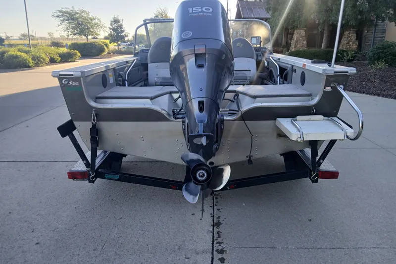 Slide: The Image of 2005 G3 Angler V175 FS boat with 150 HP motor on trailer. - 3