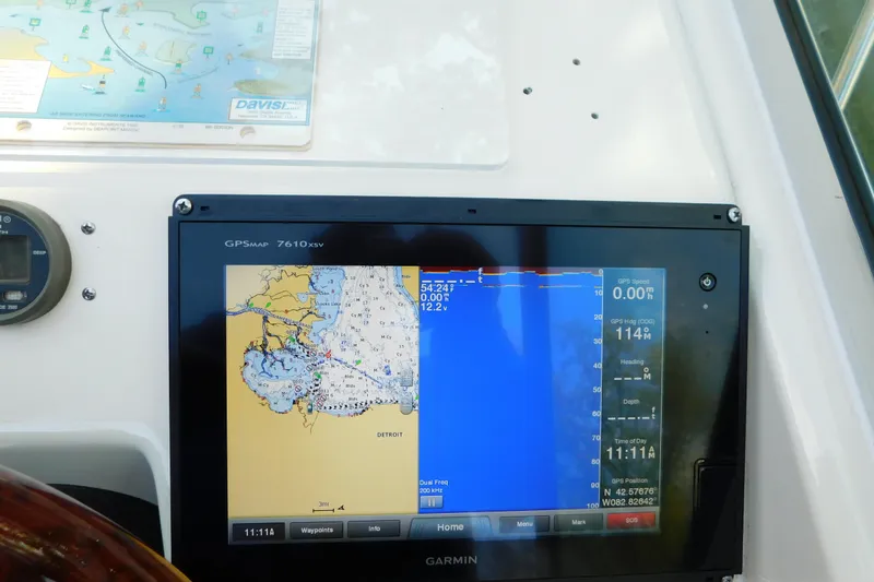 Slide: The Image of Garmin GPS display on 1996 Sea Ray 250 Sundancer boat dashboard. - 38
