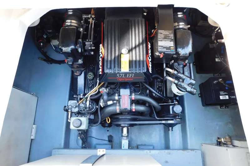 Slide: The Image of Engine compartment of a 1996 Sea Ray 250 Sundancer with MerCruiser 5.7L EFI engine. - 80