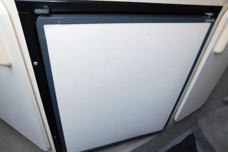 Slide: The Image of Norcold refrigerator in 1996 Sea Ray 250 Sundancer boat interior. - 61
