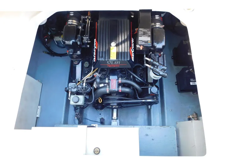 Slide: The Image of Engine compartment of a 1996 Sea Ray 250 Sundancer with a 5.7L EFI engine. - 89