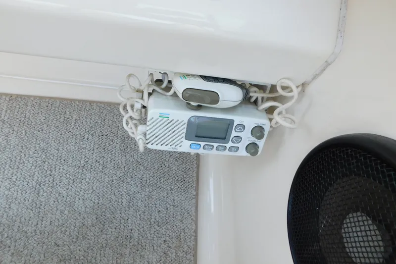 Slide: The Image of Marine radio equipment on a 1996 Sea Ray 250 Sundancer boat interior. - 35