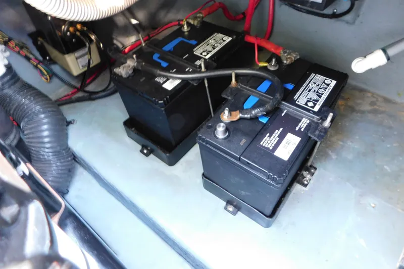 Slide: The Image of Battery compartment of a 1996 Sea Ray 250 Sundancer boat. - 83