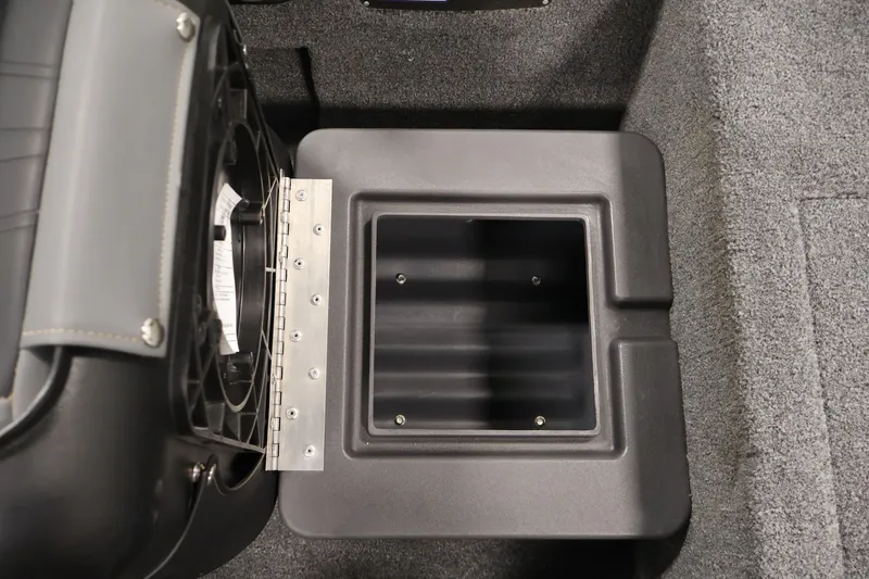 Slide: The Image of 2024 Tracker Bass Tracker Classic XL storage compartment with open lid, showcasing interior space. - 30