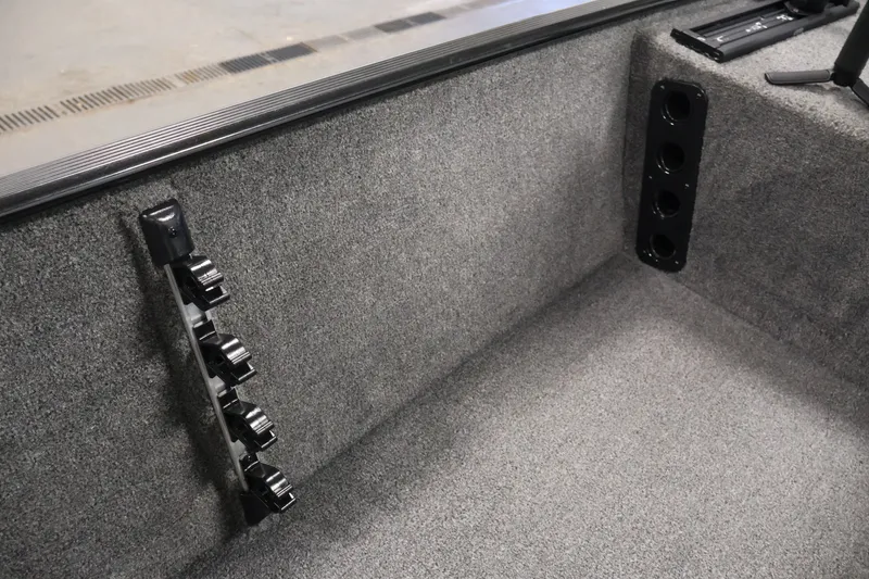 Slide: The Image of Interior of 2024 Tracker Bass Tracker Classic XL boat with rod holders and carpeted finish. - 39