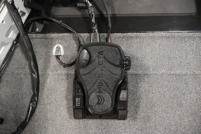 Slide: The Image of Foot pedal control on 2024 Tracker Bass Tracker Classic XL boat, featuring Minn Kota branding. - 14