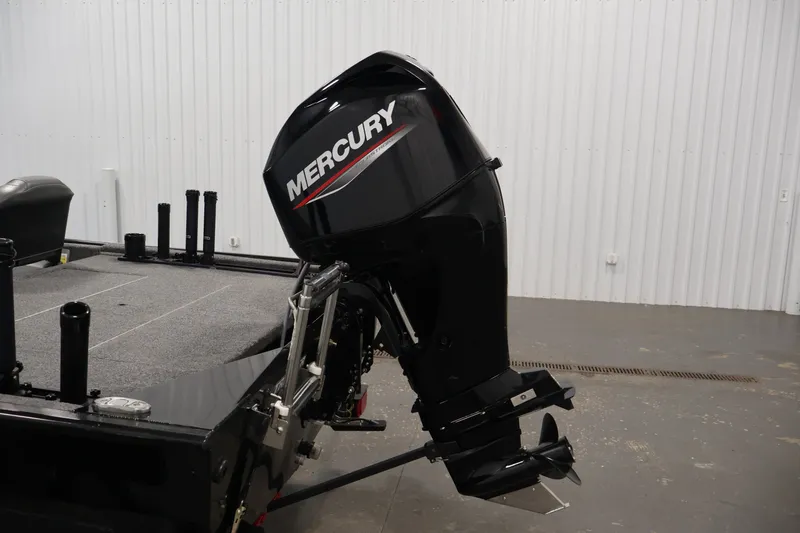 Slide: The Image of 2024 Tracker Bass Tracker Classic XL with Mercury outboard motor in a showroom. - 41