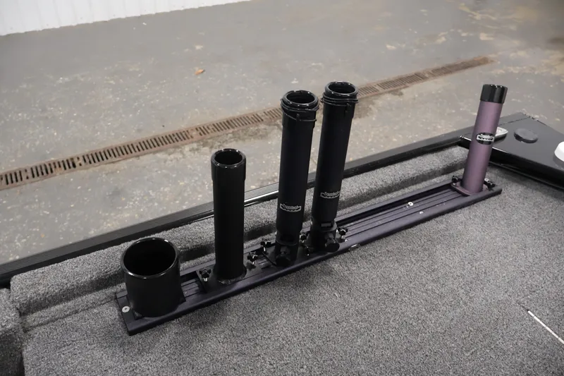 Slide: The Image of 2024 Tracker Bass Tracker Classic XL rod holders on carpeted boat deck. - 36