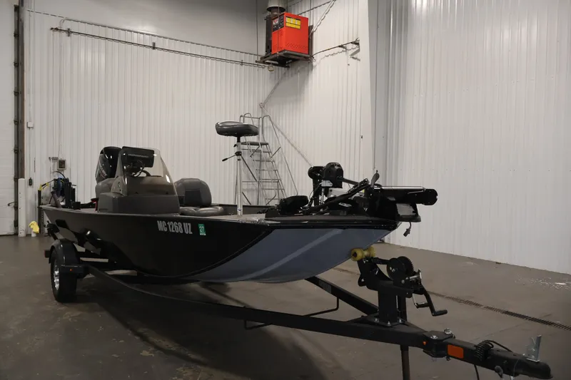 The Image of 2024 Tracker Bass Tracker Classic XL boat in indoor storage facility. - 0