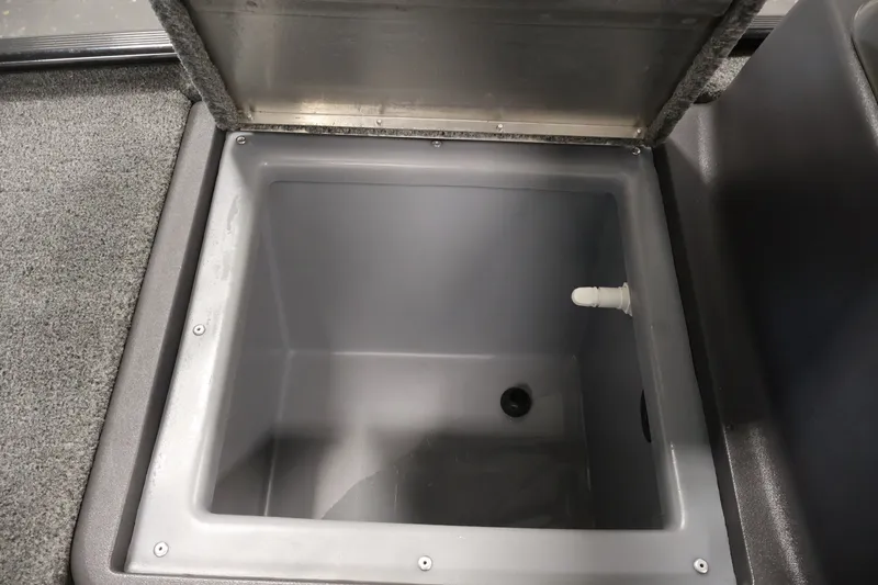 Slide: The Image of Open storage compartment in 2024 Tracker Bass Tracker Classic XL boat. - 18