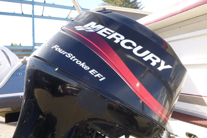 Slide: The Image of Mercury FourStroke EFI outboard motor on 2004 J 21' Neptune boat. - 11