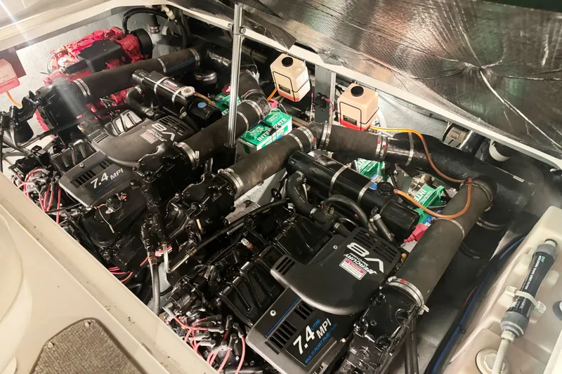 Slide: The Image of Engine compartment of a 2000 Sea Ray 340 Sundancer with dual 7.4 MPI V8 engines. - 20