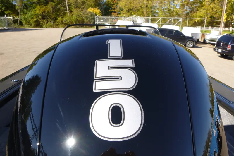 Slide: The Image of Outboard motor with "150" label on a 2027 Tracker Targa V-18 Combo boat. - 15