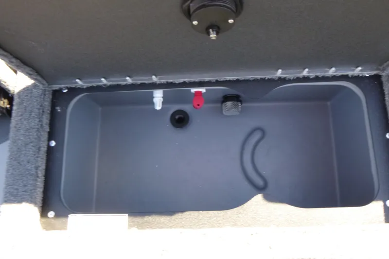 Slide: The Image of Storage compartment of 2027 Tracker Targa V-18 Combo boat, featuring interior fittings. - 14