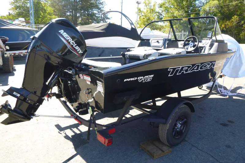 The Image of 2027 Tracker Pro Guide V-16 WT boat with Mercury engine on trailer. - 0