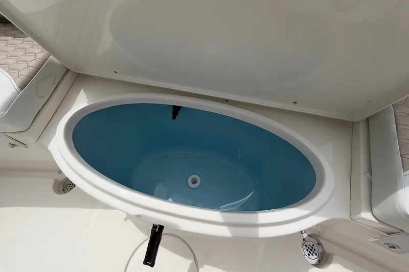Slide: The Image of Livewell in 2027 Bulls Bay 200 Center Console boat, open lid view. - 14