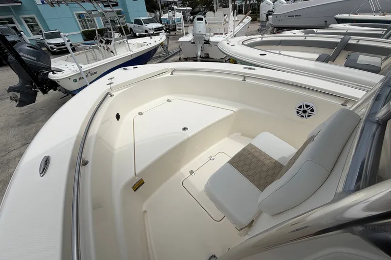 Slide: The Image of 2027 Bulls Bay 200 Center Console boat interior with seating and storage compartments. - 7