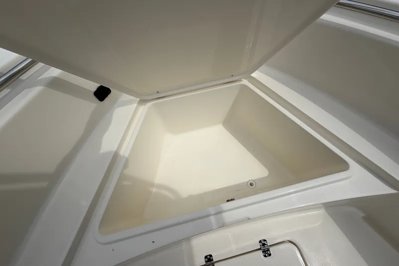 Slide: The Image of Open storage compartment on 2027 Bulls Bay 200 Center Console boat. - 8