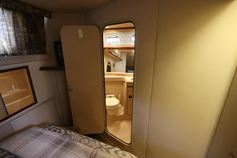 Slide: The Image of 1999 Cruisers Yachts 3750 Motoryacht interior cabin with bathroom view. - 46