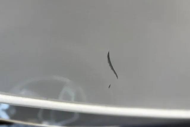 Slide: The Image of Close-up of a scratch on a 2025 Ranger ALPHA 208 car surface. - 58